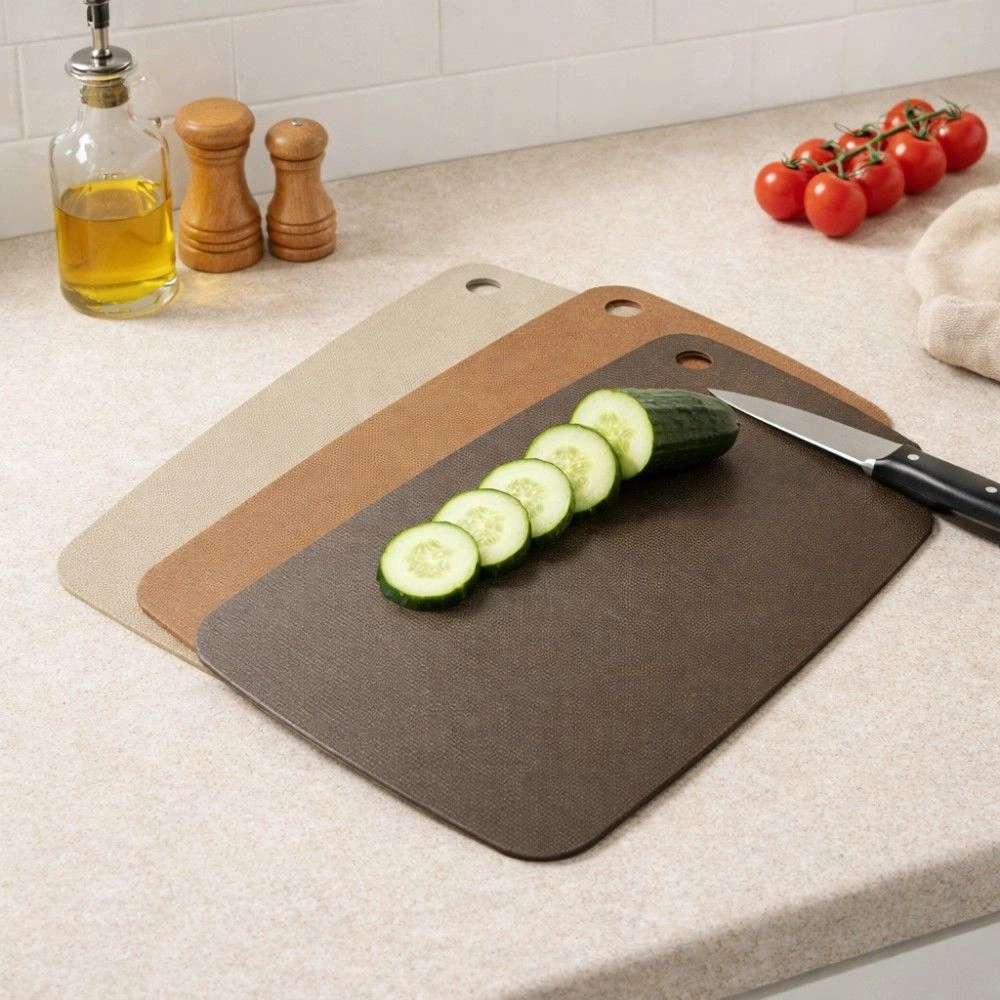 Cutting cucumber on a wood cutting boards